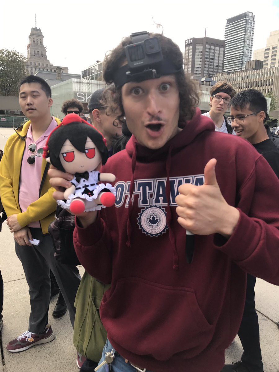 Marblelemons's tweet photo. @mc_swm and @JJ_McCullough holding an aya fumo from touhou project https://t.co/4xuEcCGgHz