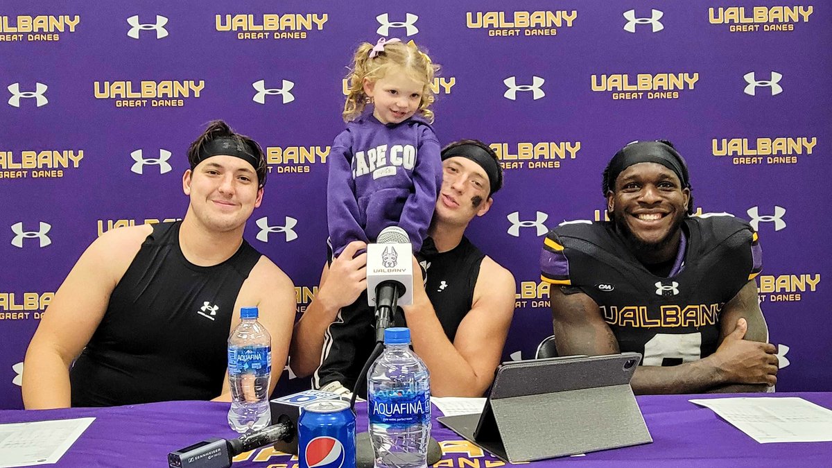 UAlbanyFootball's tweet photo. Charlotte Greaney stole the show at our postgame presser 📸 

#UAUKNOW #WinTheDay 🟪 🟨 https://t.co/cc4emP3KMM