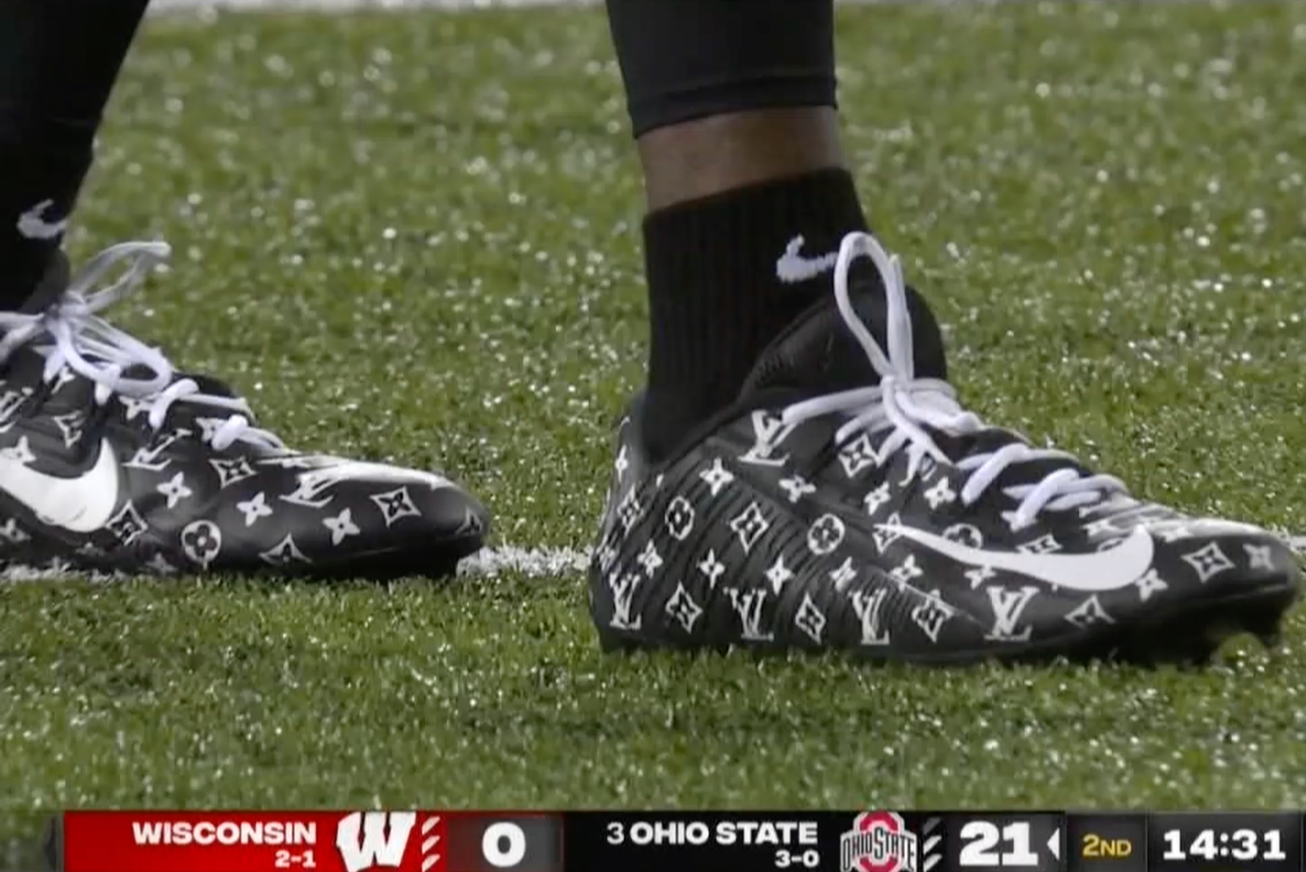 Ohio State Buckeyes receiver Marvin Harrison Jr. wears Louis Vuitton cleats  and an Apple Watch - ESPN