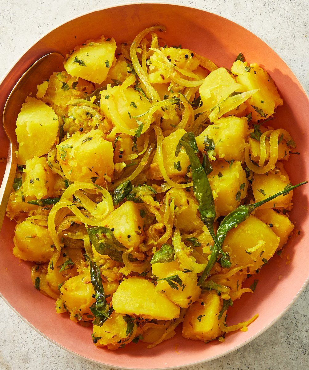 thekitchn's tweet photo. Batata Bhaji, Executive Editor Adriana's husband's favorite potatoes, are worth eating every single day. It has all the carby softness of good comfort food, but it’s also fragrant, with layers of spice and flavor: https://t.co/JkOIYwkwSs #kitchn100 https://t.co/ZGwKbMXYF7