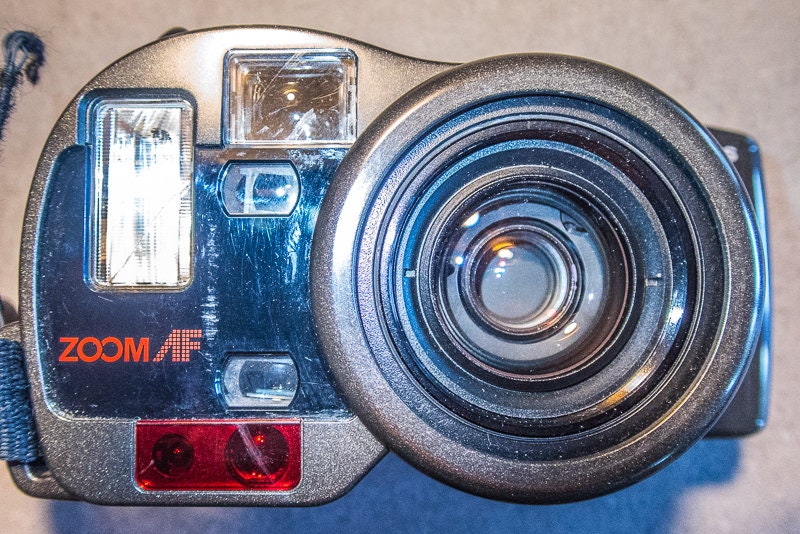 Excited to share the latest addition to my #etsy shop: Olympus AZ 330 Super Zoom etsy.me/3LKJ4u2 #black #olympus35mmcamera #olympuscamera #35mmfeatures #lowcostcamera #cameraandbag #unusualcamera #spaceagecamera #largelens