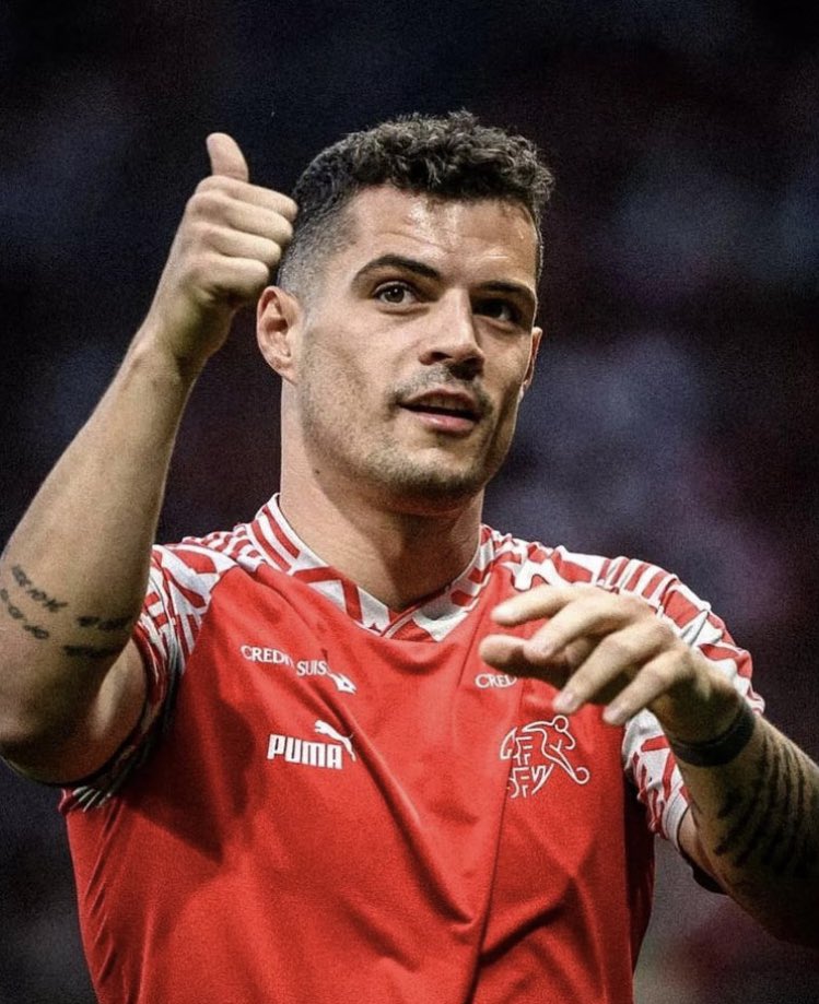 Dancomunyao's tweet photo. Captaining Switzerland to win against Spain in their own yard. Mr Arsenal. https://t.co/teOYF6FD15