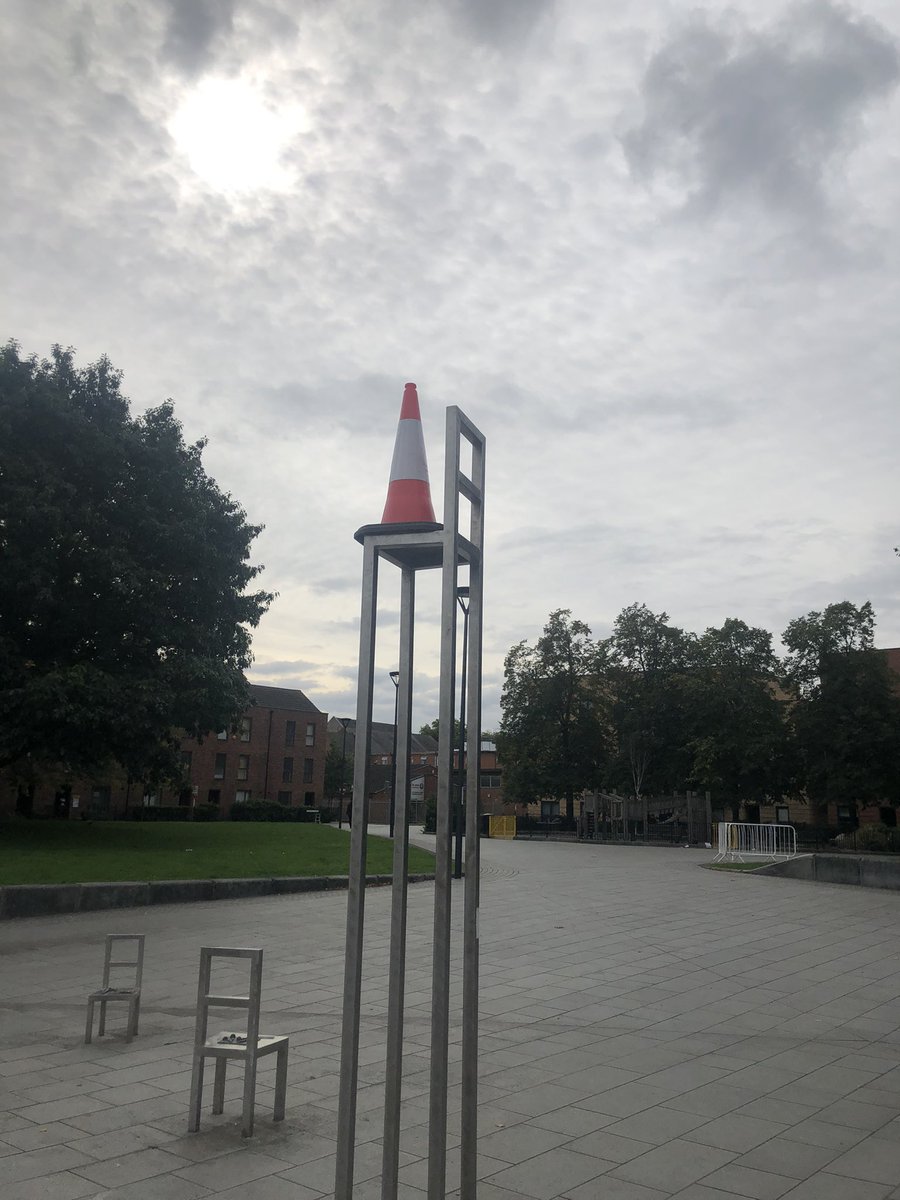 I’ve lived near these chair sculptures for over 2 years now, and I’m surprised that this is the first traffic cone I’ve seen on the tall one.