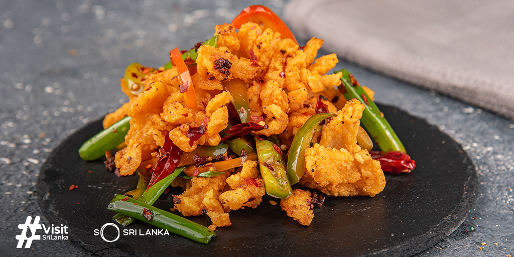 tourismlk's tweet photo. Indulge in the crispy, spicy hot butter cuttlefish which is a Chinese Sri Lankan fusion dish unique to the island
.
.
.
#SoSriLanka #ExploreSriLanka #VisitSriLanka #SriLankaTourism #SriLankaTravel #SriLanka #HotButterCuttleFish #CuttleFish https://t.co/3n6wD5pAwG