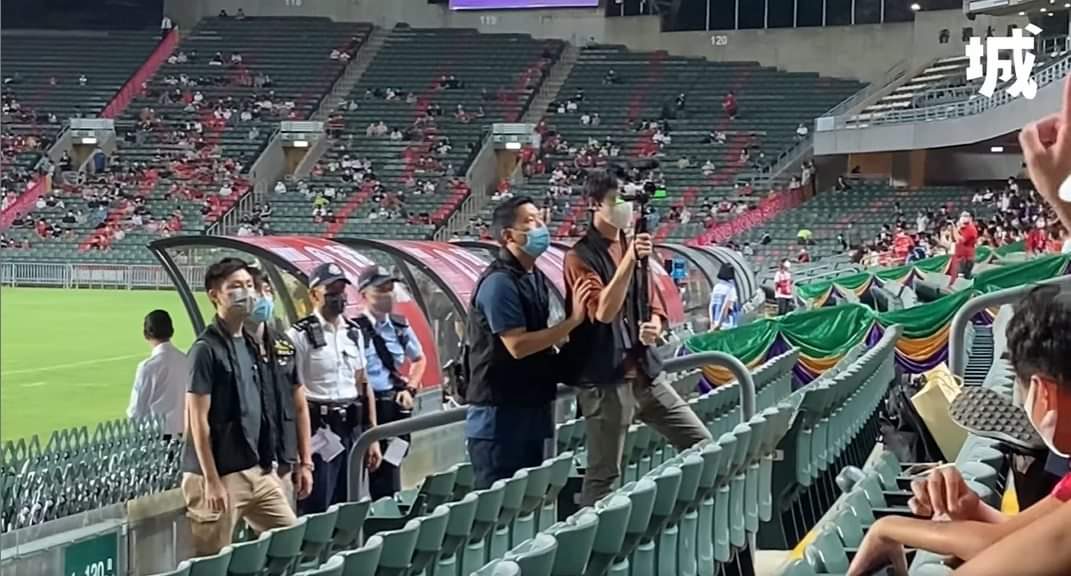 In an international football friendly today, Hong Kong Police filmed everyone in case the audience acts unpatriotically against China. Which country on earth can be more totalitarian than this? Link to video: fb.watch/fMcw8Tgu9f/
