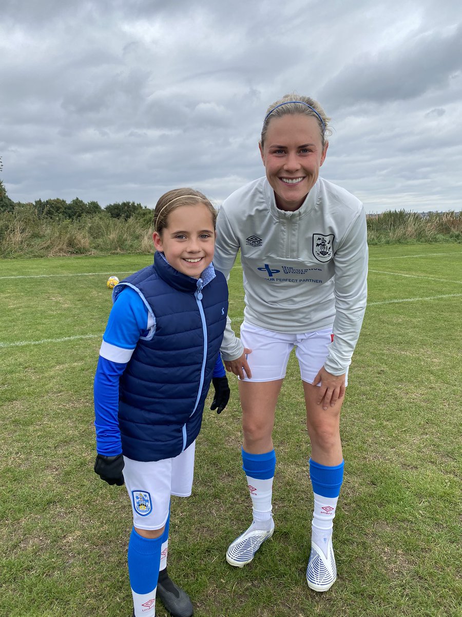 HTAFCWomen's tweet photo. Mascot for the day Ada Green pictured with @HTAFCWomen player Kate Mallin prior to this afternoons @FAWNL League cup game vs @StourbridgeWFC 

#WeAreNational #UTT https://t.co/iaO4k8tAq4