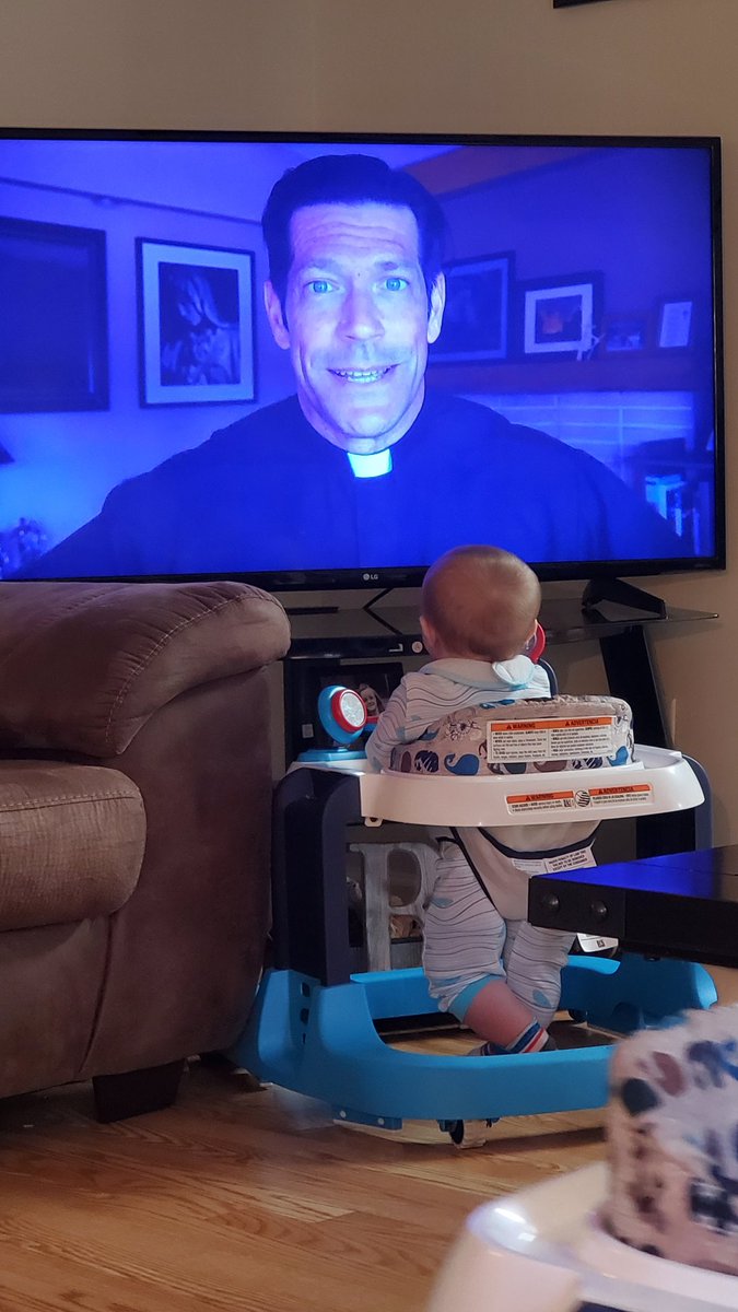 Clayton watching <a href="/frmikeschmitz/">fathermikeschmitz</a> this morning. #Catholic