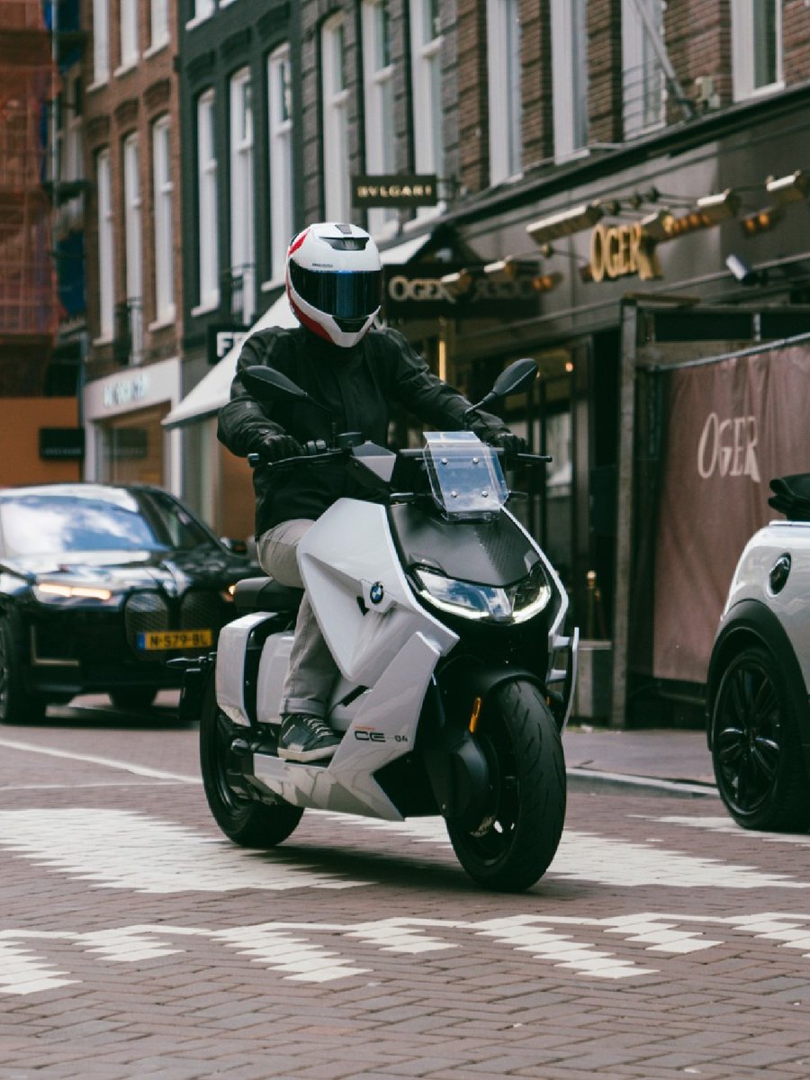 BMWMotorrad's tweet photo. The #BMWCE04 is for those who love innovation and that are inspired by revolutionary technology and futuristic design. What do you like about our scooter the most? ✨

📸: bmwmotorradnederland (IG)

#MakeLifeARide #PluggedToLife #BMWMotorrad https://t.co/rWHBPm9KLR