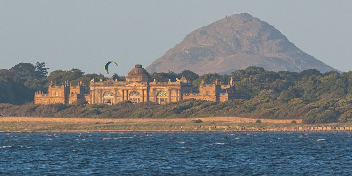 goeastlothian's tweet photo. Kitesurfer on #eastlothian's coastline with Gosford House and North Berwick Law as the perfect backdrop! 💛
#loveeastlothian #TalesofScotland #onlyineastlothian #onlyscotland https://t.co/Zkpb3sDREo