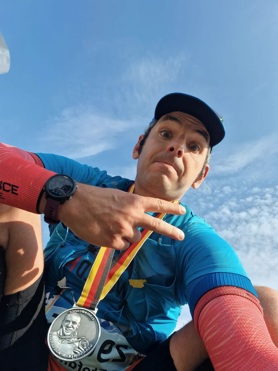 Selfie with the Berlin Marathon medal, I look tired but happy