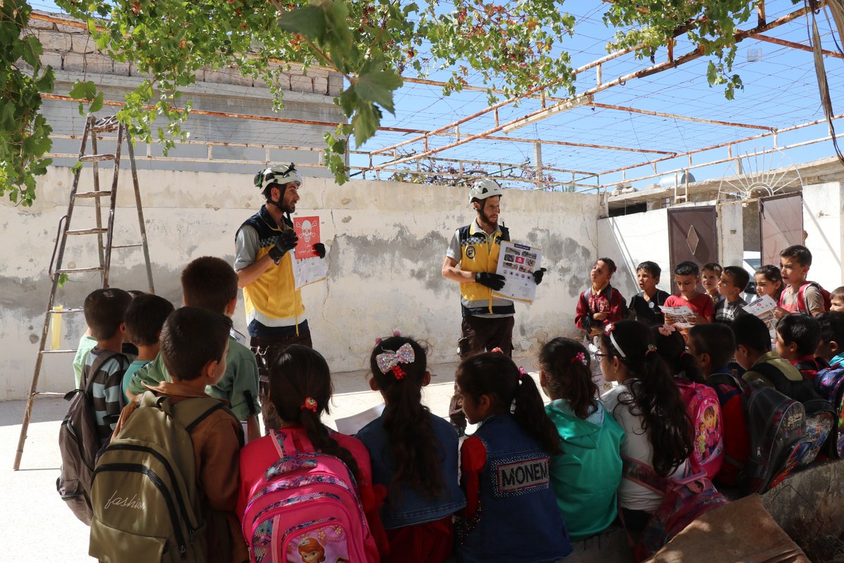 SyriaCivilDef's tweet photo. The UXO teams intensify awareness sessions for civilians about the dangers of unexploded ordnance and ways to prevent them in conjunction with the start of the new school year and the approaching olive harvest season in the NW #Syria https://t.co/lch0w3fHr6