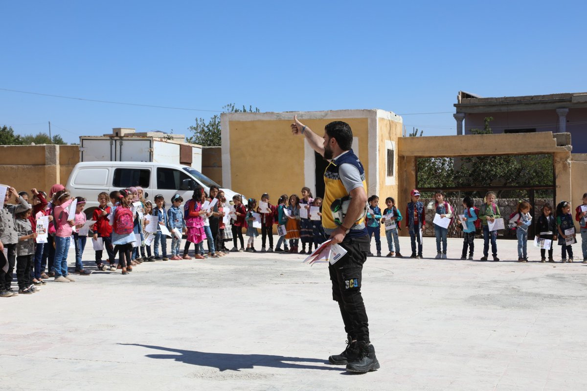 SyriaCivilDef's tweet photo. The UXO teams intensify awareness sessions for civilians about the dangers of unexploded ordnance and ways to prevent them in conjunction with the start of the new school year and the approaching olive harvest season in the NW #Syria https://t.co/lch0w3fHr6