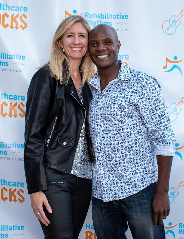 SarahBellum5280's tweet photo. My spouse and I at our first fundraiser since I transitioned the small business to a nonprofit. Included our aphasia choir accompanied by healthcare workers who are musicians #PossibleWithMusic https://t.co/0Fe69aENRc