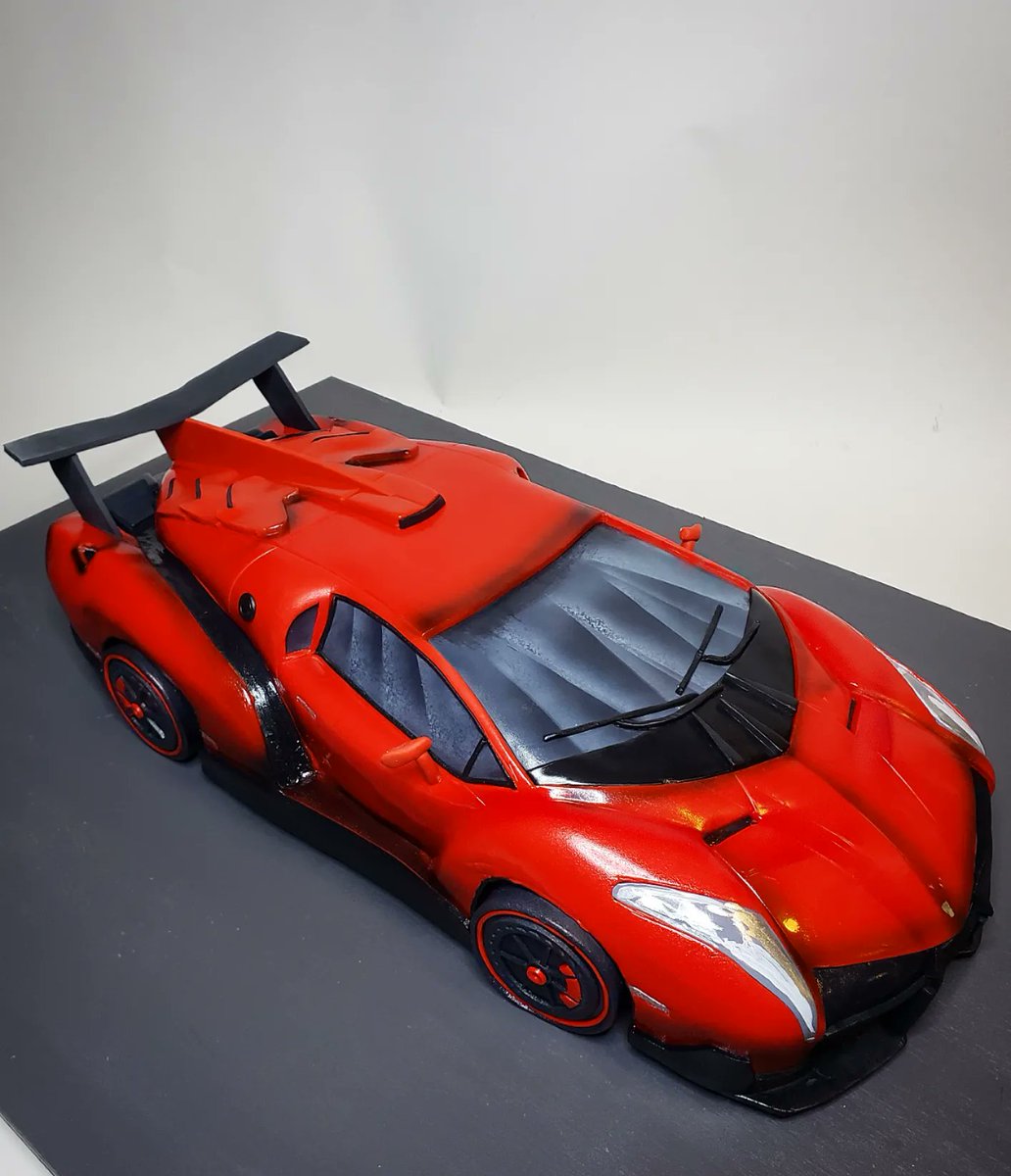 AlexeyBakes's tweet photo. Lamborghini Veneno cake I made last week. #Chocolate #cake with chocolate #buttercream It was my third car cake in 8 years, so happy to see the progress! #carcake #cakeinnyc #3dcake #isitcake #lamborghinicake https://t.co/CNfcW9Z9rR