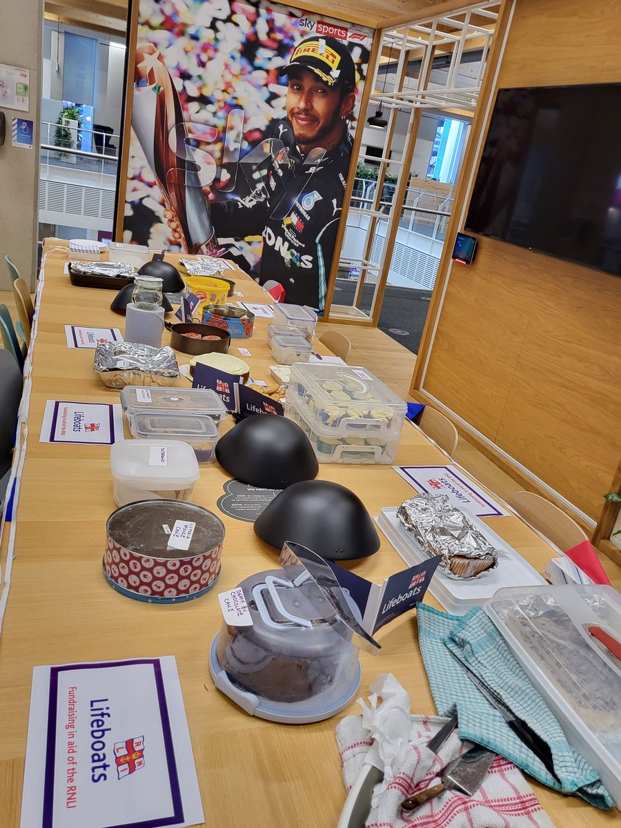 julia_sian's tweet photo. The Sky bake sale in aid of the RNLI is open for business 😀 the camera angle makes it look like @LewisHamilton is hosting!! @lifeatsky https://t.co/0tPAWobAk8