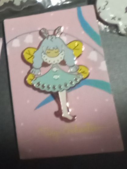 This is probably a long shot but I went to #eccc in 2021 and got this #enamelpin and genuinely curious if artist has more like this #mothfairy #moths