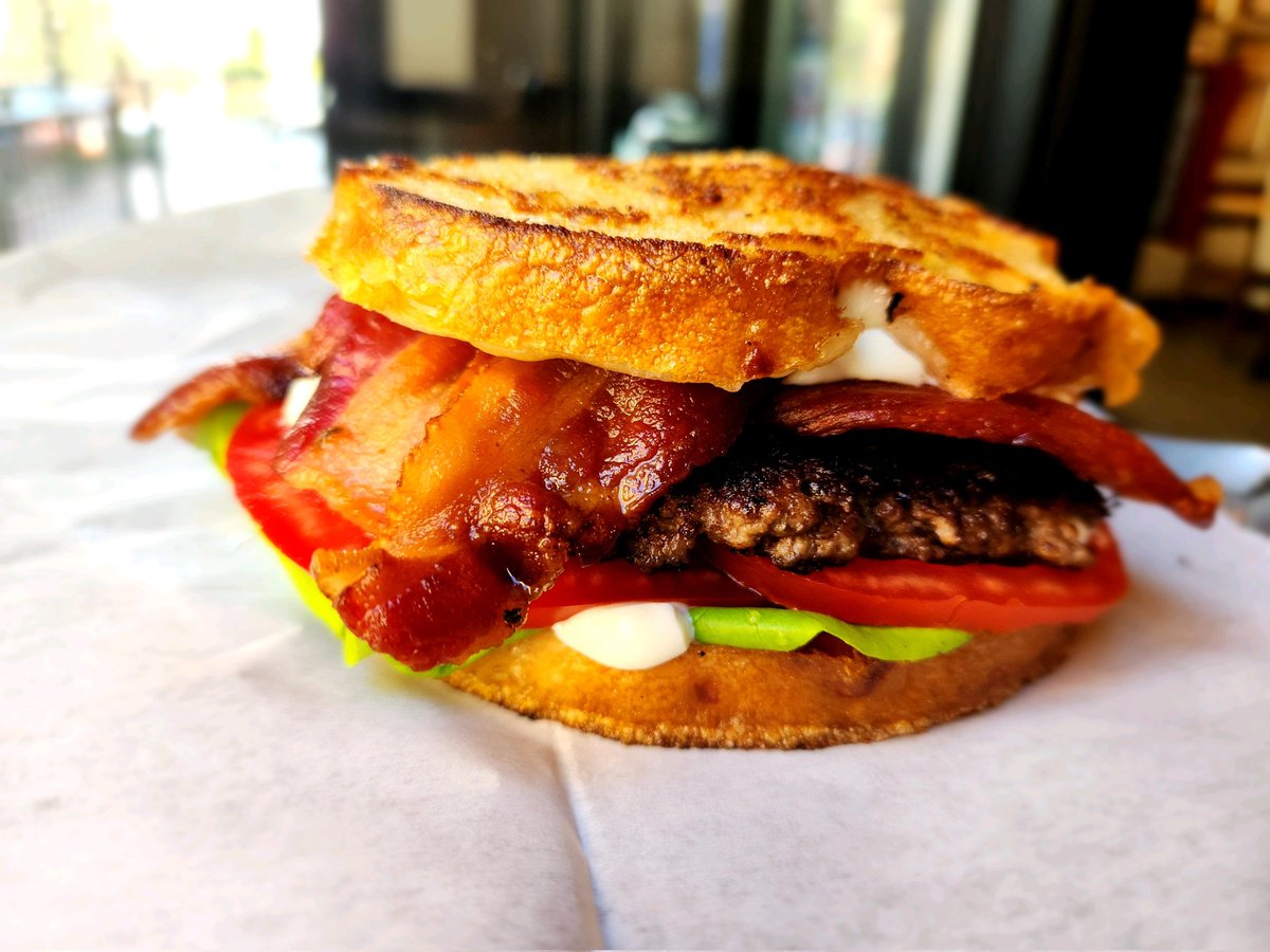 End of summer bbelt!  Griddled le q cheddar bread, provolone, bbq glazed super smashed bacon patty, extra extra bacon, lettuce, mayo, local tomato, Evetta Farms egg.  Come see us!!!