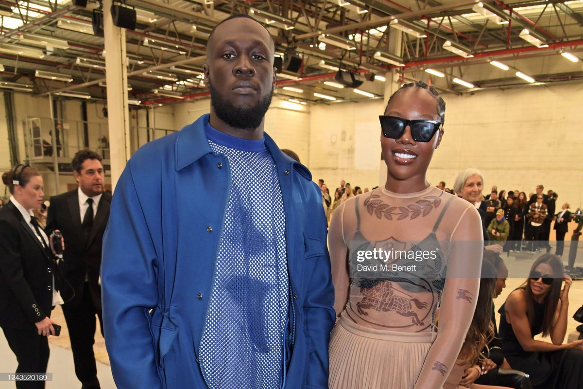 “We just stepped all clean and said, ‘#MelMadeMeDoIt’” Stormzy and stylist Melissa Holdbrook-Akposoe (Melissa’s Wardrobe) attend the Burberry Spring/Summer 2023 show in London