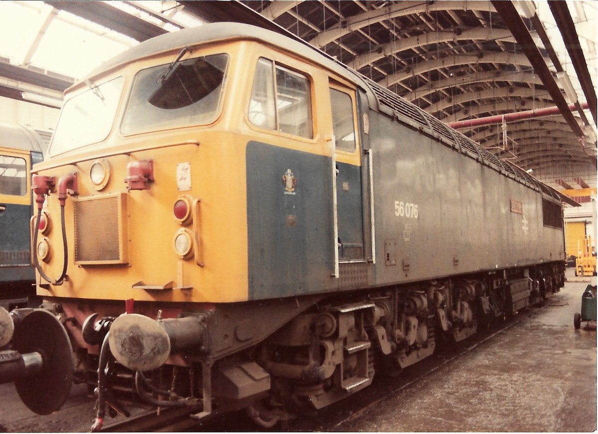 Gateshead TMD 24th April 1983 British Rail Class 56 diesel loco 56076 'Blyth Power' inside its home shed BR Blue colours with the Gateshead Coat of Arms on the cabside #BritishRail #Gateshead #Class56 #CoatOfArms #BRBlue #Blyth #trainspotting 🤓