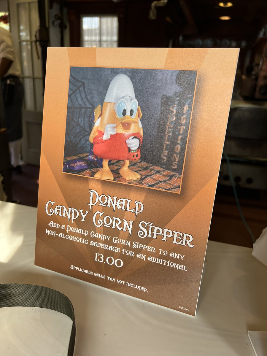 WDWNT's tweet photo. Donald candy corn sippers are still available at Sleepy Hollow 🍬 https://t.co/rrDDGPrUkc