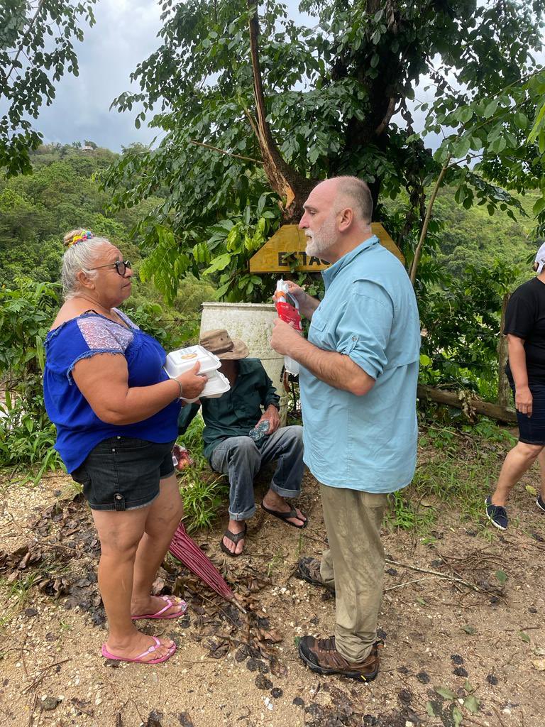 WCKitchen's tweet photo. About 30 families in a community in Utuado, Puerto Rico have been cut off from neighboring towns due to a bridge destroyed in the hurricane. To ensure they have fresh, hot meals, the WCK team crosses the river when it’s low enough to safely deliver! #ChefsForPuertoRico https://t.co/5L5X8FNHV2