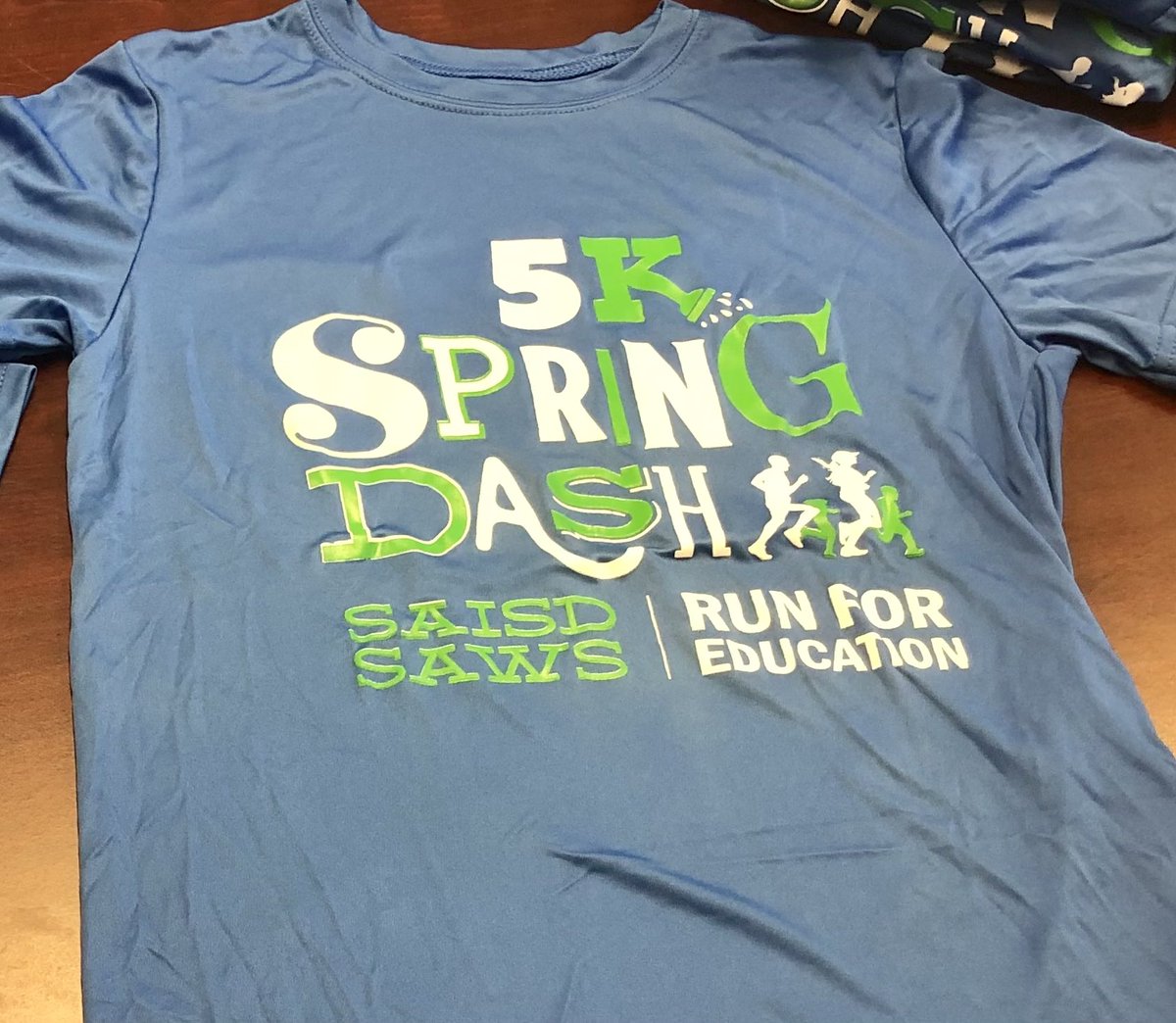 SAISDFoundation's tweet photo. If you are in school in @SAISD and you can you some youth past 5k run shirts, message us. We have 19 of the orange and 13 of the blue. For use in school stores or as giveaways. #cleaningout https://t.co/Bj0k6gyJxq