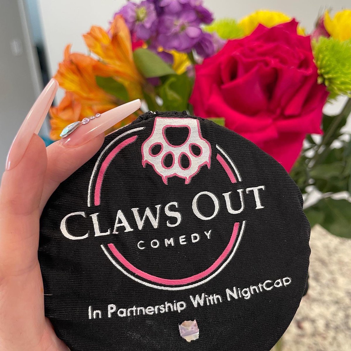 ClawsOutComedy's tweet photo. Pre-order #ScrewedbyRuthBanks now at the link in our bio! We’re also so excited to announce our new partnership with #Nightcap- keep the bugs and the dr*gs out of your drink. Mental Health Advo-Cat merch is still up for sale on our site too! 🐈‍⬛✨ https://t.co/f915G0nJWS