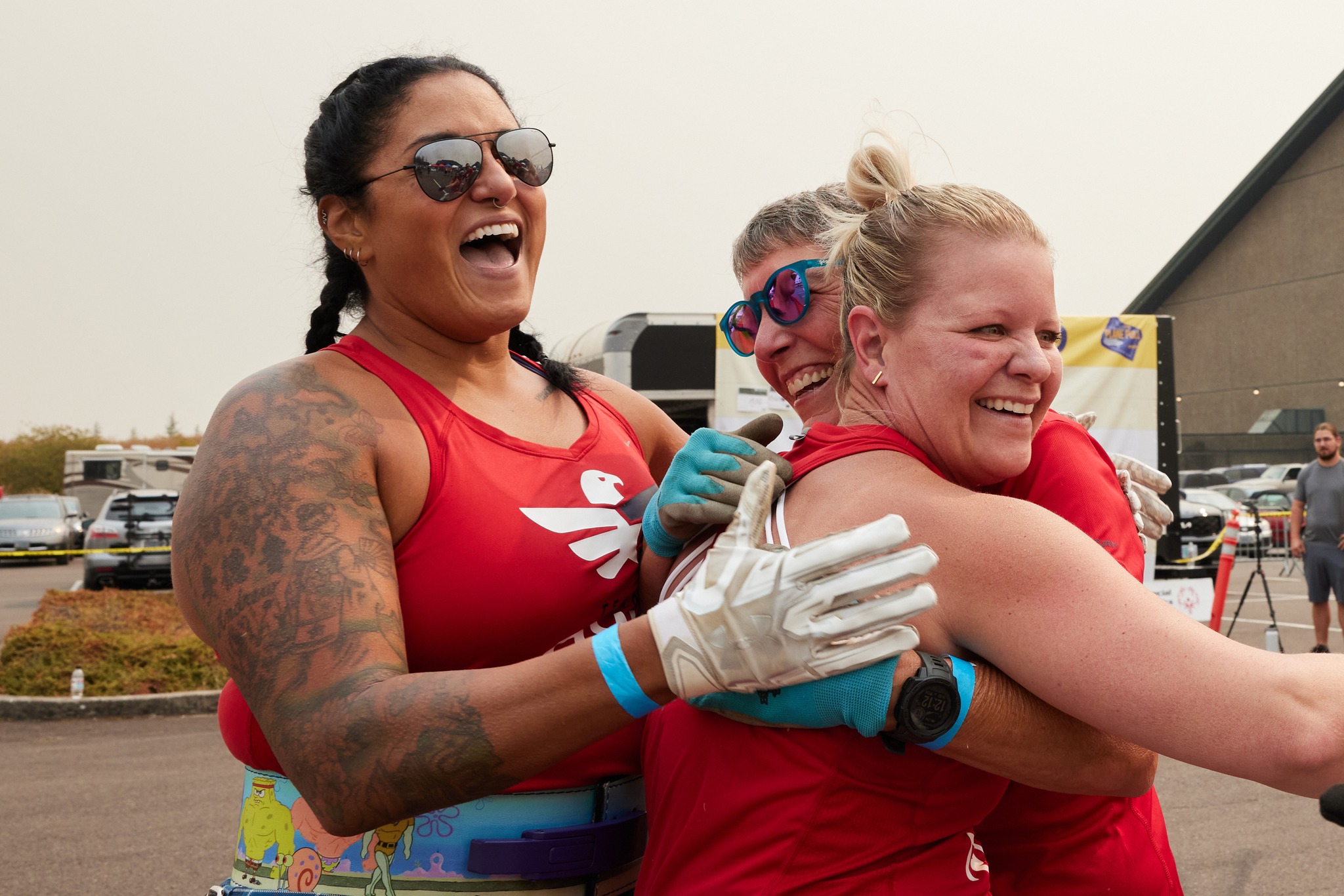 Photo of a group of Team R-W-B members hugging.