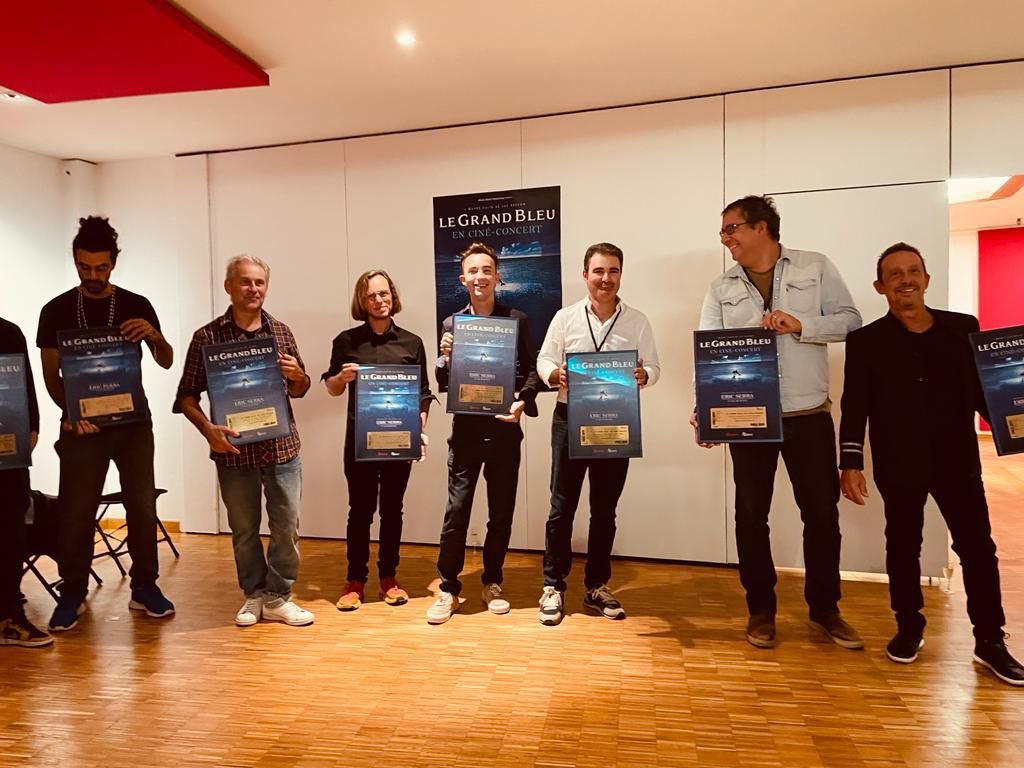 GDP's tweet photo. Le Grand Bleu en ciné-concert : plus de 50 000 billets vendus 🎉 À cette occasion, Matthieu Drouot a remis un Ticket d’Or à Éric Serra et son équipe 👏🏻 https://t.co/s2KDXBxxdo