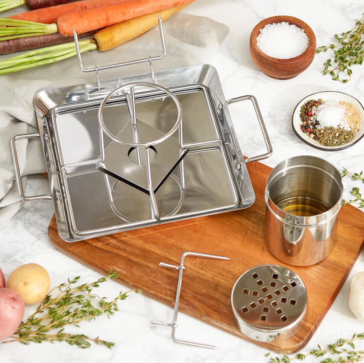 DepartmentStore's tweet photo. The RSVP Endurance Vertical Chicken Roaster is our Gadget of the Week! 😍🍗 #nationalchickenmonth https://t.co/HzwVIdz9an