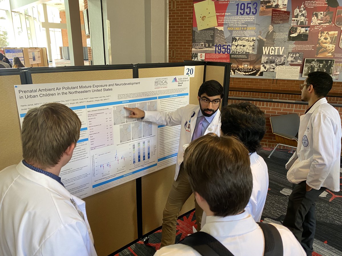Our M2s presenting their posters at the 12th annual Research Symposium