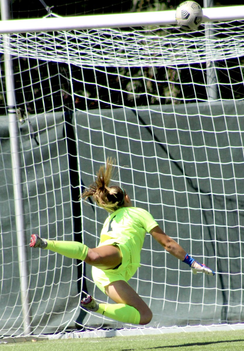 SchuckSports's tweet photo. Sunday at Legends Stadium, with about six minutes remaining in regulation, @QUWSoccer goalkeeper Olivia Kindt made a dazzling save off a shot from the right side of the box, punching it off the crossbar. Here's two pictures of the save: https://t.co/IoEMva25jE