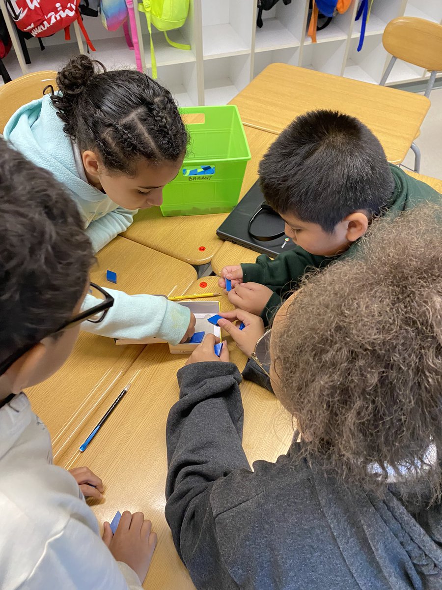 Today we used nonstandard units to measure volume. Students used math discourse to debate which pattern block would give the measurement closest to the actual volume! @AmerigoSchool #TogetherWeCan