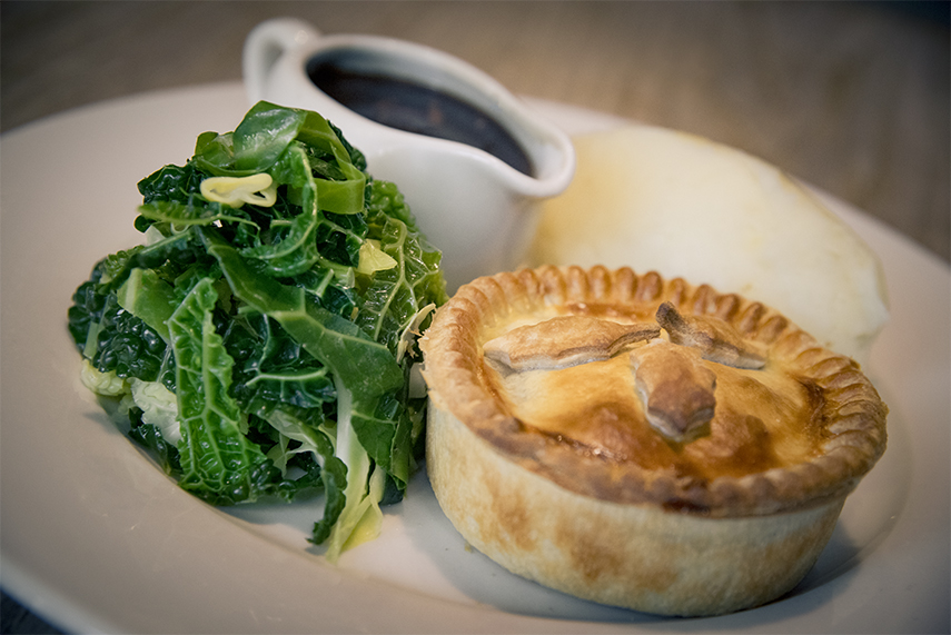 Using the finest ingredients from local farmers, butchers and other regional suppliers, our pies are all cooked freshly on the premises to order. Our greens vary seasonally, and are always fresh and local where possible. 
Give us a call (01803) 868674 to book your table or pies!