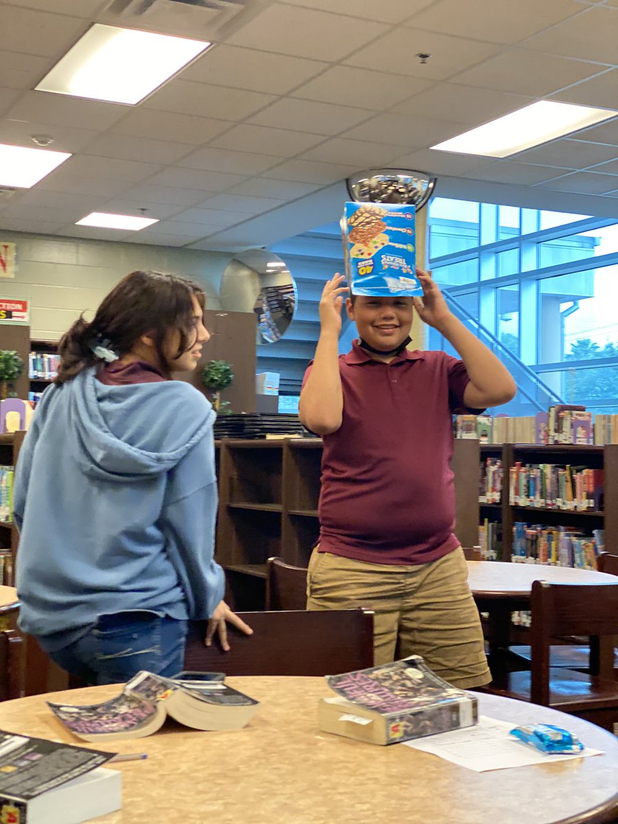 WISDCentralLib's tweet photo. Book club today!  We read, we discuss, we snack and we laugh! https://t.co/6aMZiyBKPV