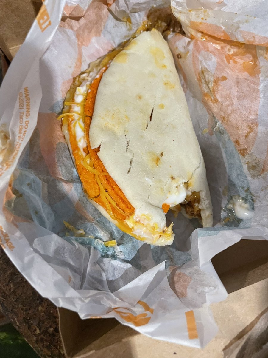 _adthoughts's tweet photo. @tacobellcare what happened here? Just got severed this bitten taco 🤮🤮 so nasty @tacobell https://t.co/Qng3Hq9afi