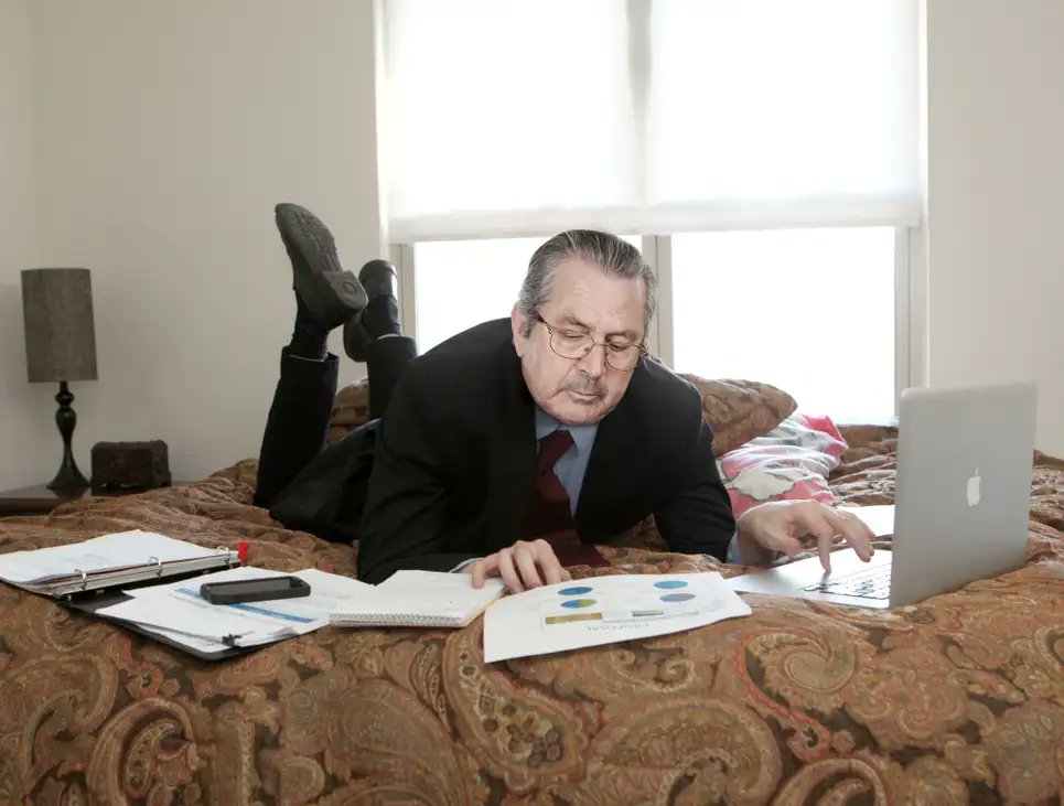 TheOnion's tweet photo. Businessman Does His Work Lying On Bed Like Schoolgirl https://t.co/T9yzDyuokd https://t.co/5zycYeyNDD