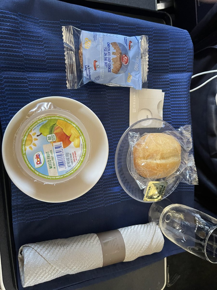 chrisdon99's tweet photo. @united is this the new ‘premium cabin’ standard? A fruit cup? Seriously, this is unacceptable… https://t.co/wCaa0JtPh6