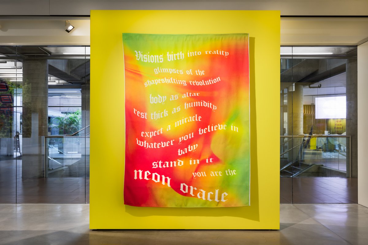 utsart's tweet photo. Hannah Brontë says: "All my artworks come to me in dreams first, then they trickle into reality." Visit the exhibition and Hannah Brontë's new digital commission POWA WAVE, now showing on the UTS Broadway Screen. #HannahBrontë #neonoracle #powawave #text #utsart https://t.co/BpkKwMwOxC