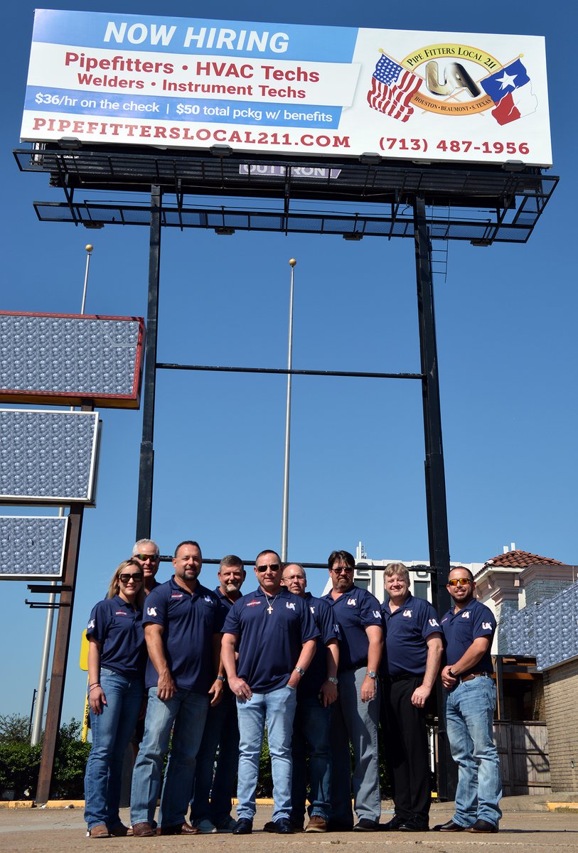 Posing with our new billboard.