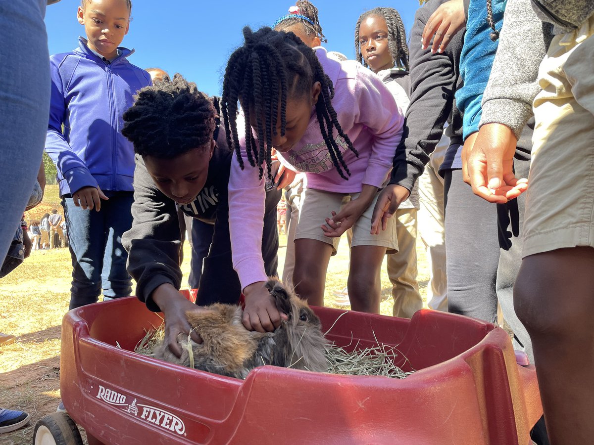 USDA_NRCS_GA's tweet photo. We are out here at @ChattHillsChSc for the @USDA Urban Ag Kickoff event.  It’s awesome to see these kids enjoying what agriculture has to offer them as they consider their futures. https://t.co/m831OnCVyB