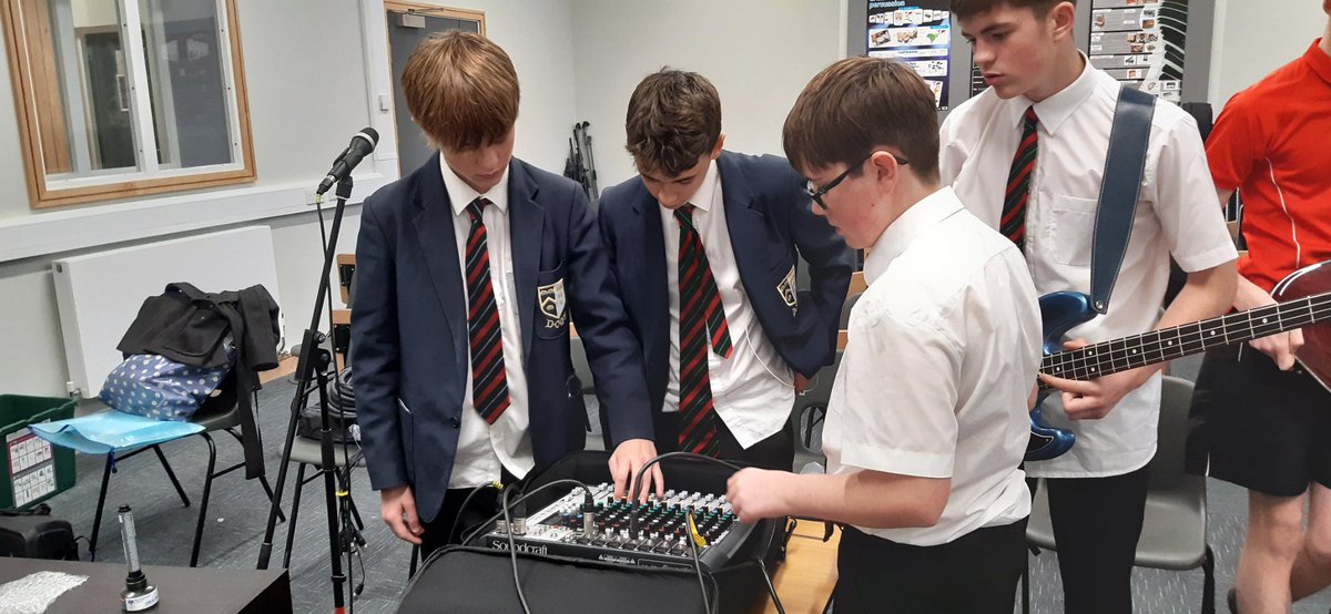 Members of "Rock Club!" learning to mix sound with our new equipment. Thanks to Dom Harter for his generous donations and help with the tech.