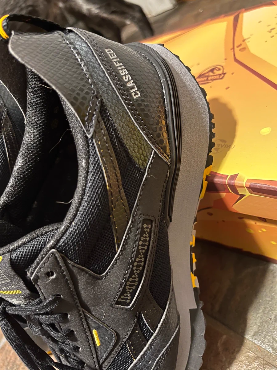 The sides of the Jurassic World Reeboks, with the DNA double helix logo.