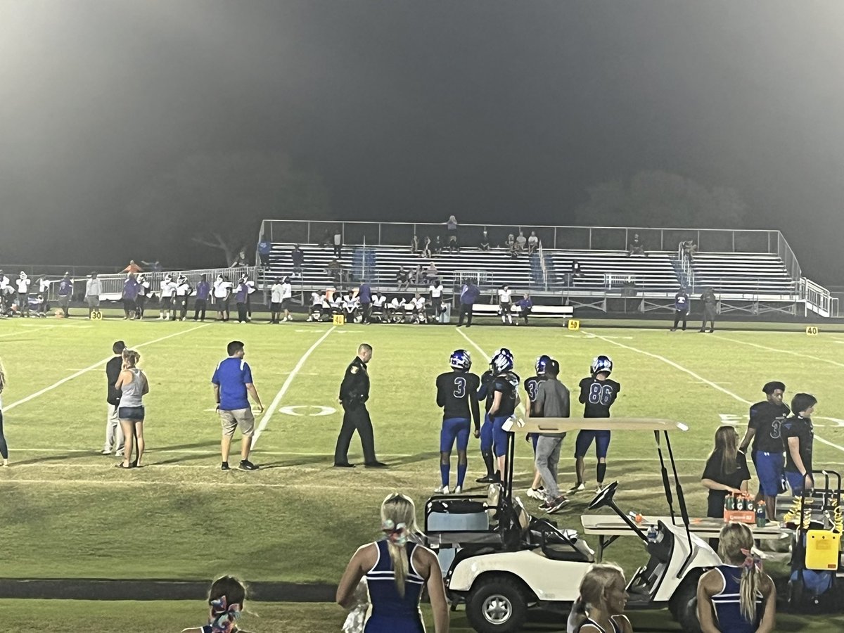 St. Johns County Sheriff @Rob_HardwickFL performing double duty after a long day prepping @SJSOPIO for Ian, on the sideline for @MenendezFootba1.