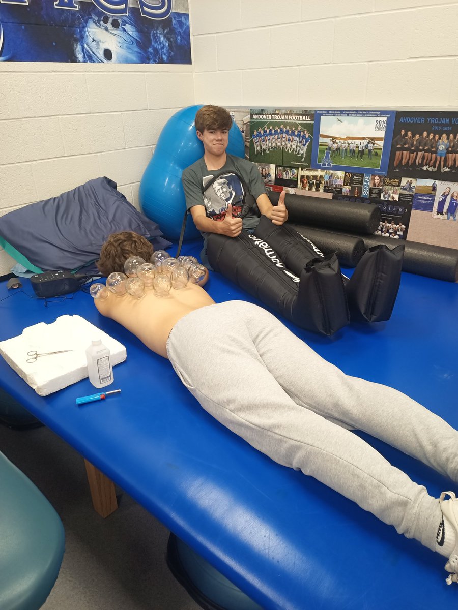 Soccer players getting right before the long trip to Salina. Andover Athletic Training always here for all your recovery needs! JP got fire cupping 🔥 done on his back and Grayson wanted to try the new Normatec Boots or Spacesuit as the athletes call it now 🚀👽