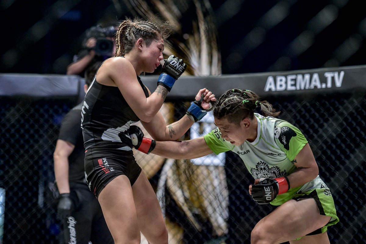 DrakeRiggs_'s tweet photo. Champions Xiong JingNan and Angela Lee battled it out in an all-time classic bout not once but twice. At #ONEonPrimeVideo2, part 3 aims to surpass the insane appetizers.

The history has already been made. Now, it's just about #TheDefiningMoment.

📖: https://t.co/hOXi3YpToz https://t.co/FwyP32n14Z