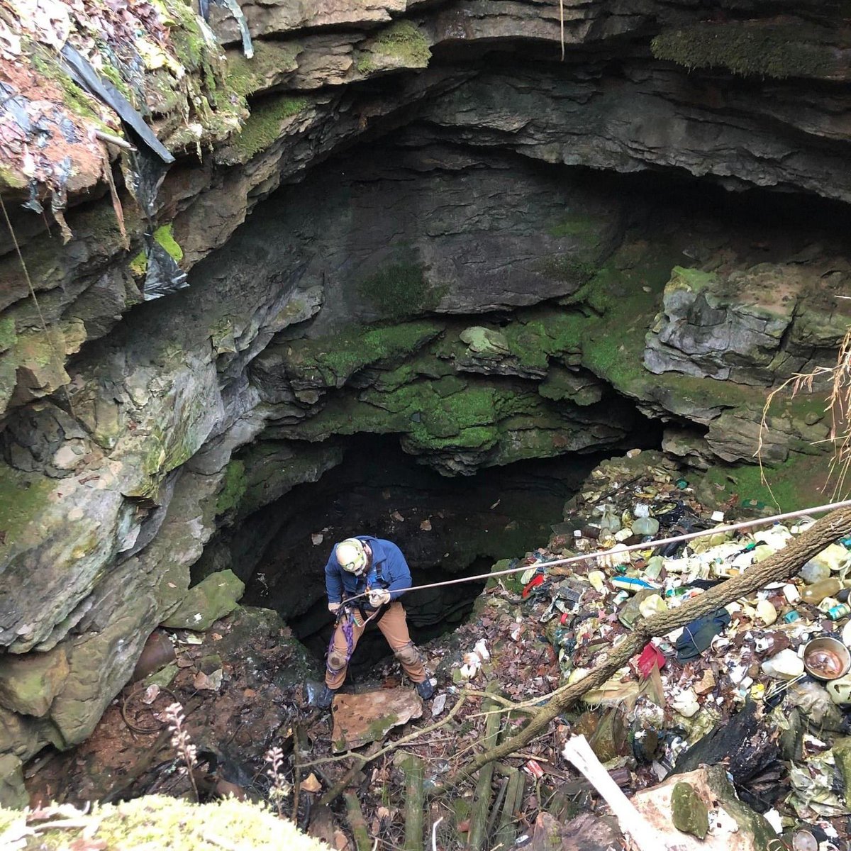 american_cave's tweet photo. If you would like to volunteer with us please email chelsea@caveconservation.com and she will add you to the notification list.

Pictured here is a sinkhole full of trash. This is one of many projects that needs volunteers! https://t.co/UyxK9U4CGt