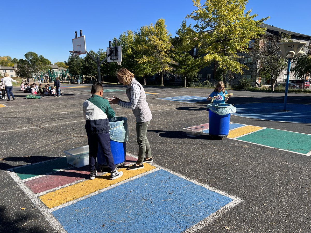 Corn husking relays in 3rd grade