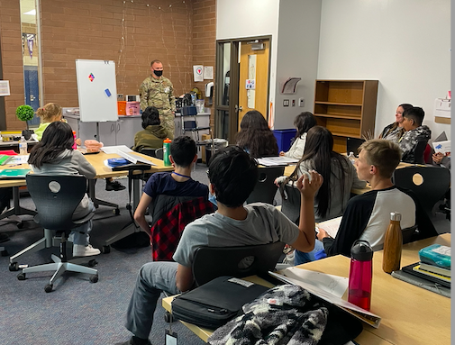 MissPotter16's tweet photo. Former Friendship student and Miss DeSilvia's brother, Nick DeSilvia, returned to his alma mater as an Air Force Helicopter Pilot and presented to our college and career ready classes in AVID/AVID Excel.  @D59Friendship @KellyLinsner https://t.co/C7NGzp4snA