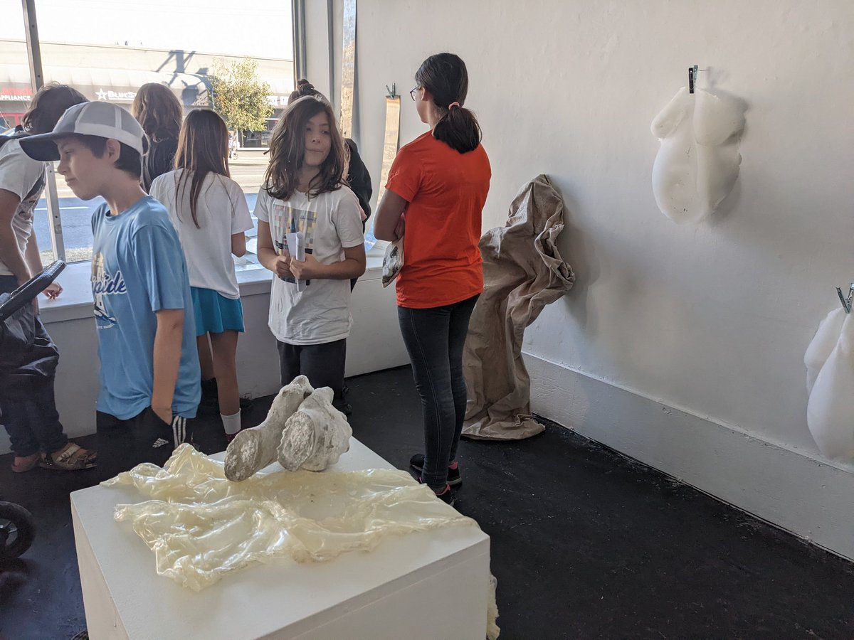 visii_school's tweet photo. Today the learners stopped by 
@thefiftyfifty to talk to artist Xan Shian about her wonderful show "Seal-Mara", which explores connections between the body, Gaelic mythology, and the intertidal zone. #YYJArt https://t.co/dfHiXNZv3S